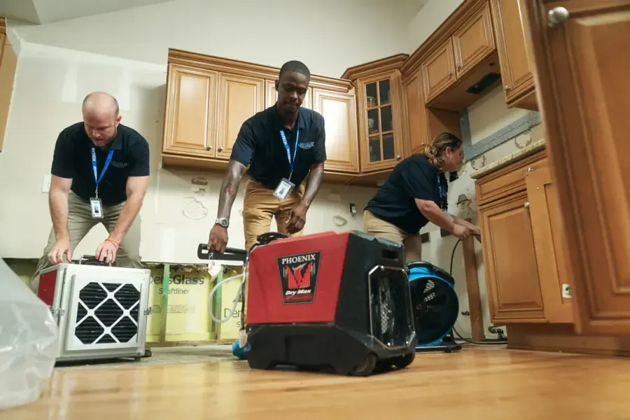 Forest Park Water Damage Pros crew running an air scrubber in a water damaged Forest Park, GA kitchen