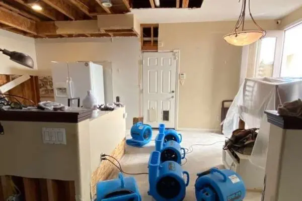Air movers drying a Forest Park, GA room after a leak